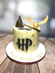 Harry Potter buttercream cake, with golden snitch and sorting hat