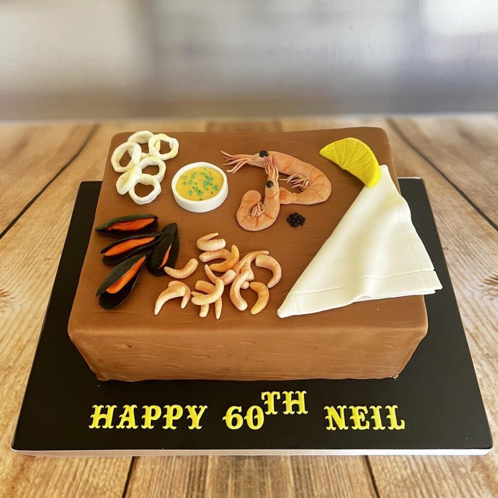Illusion cake in to represent a plate of seafood.