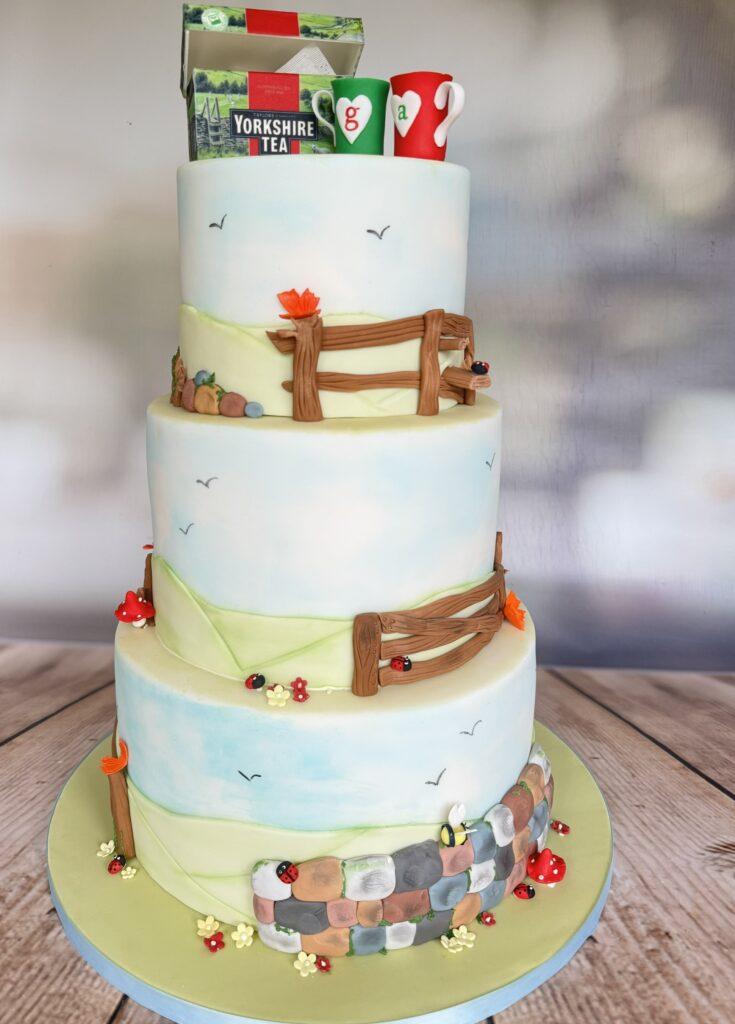 Yorkshire Tea wedding cake, with dry stone walls and handmade tea box.